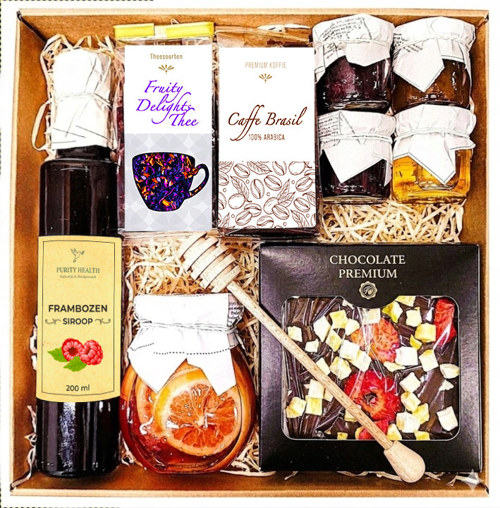 Geschenkmand geschenkset cadeau thee honing chocolade siroop citroen koffie