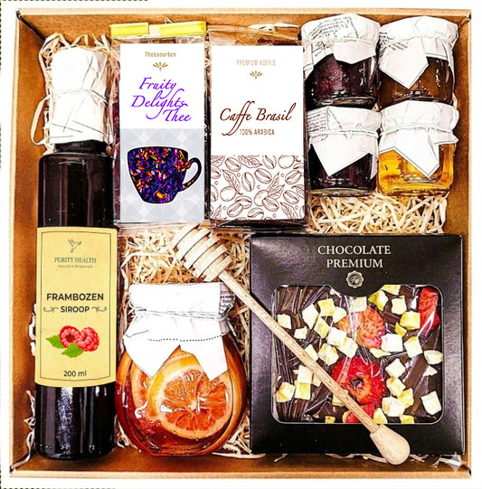 Geschenkmand geschenkset cadeau thee honing chocolade siroop citroen koffie