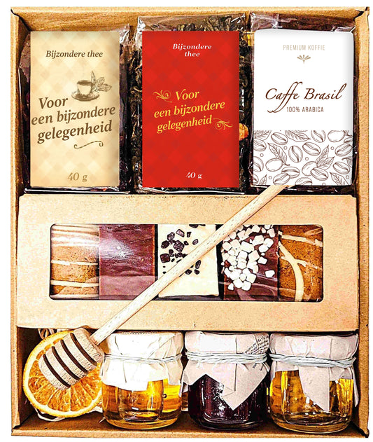 Geschenkmand met thee, honing en peperkoek